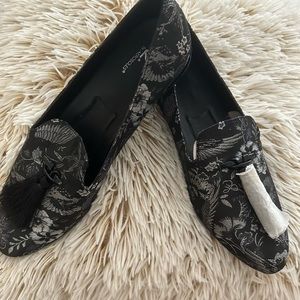 Loafers with tassels. Silver embellishments.